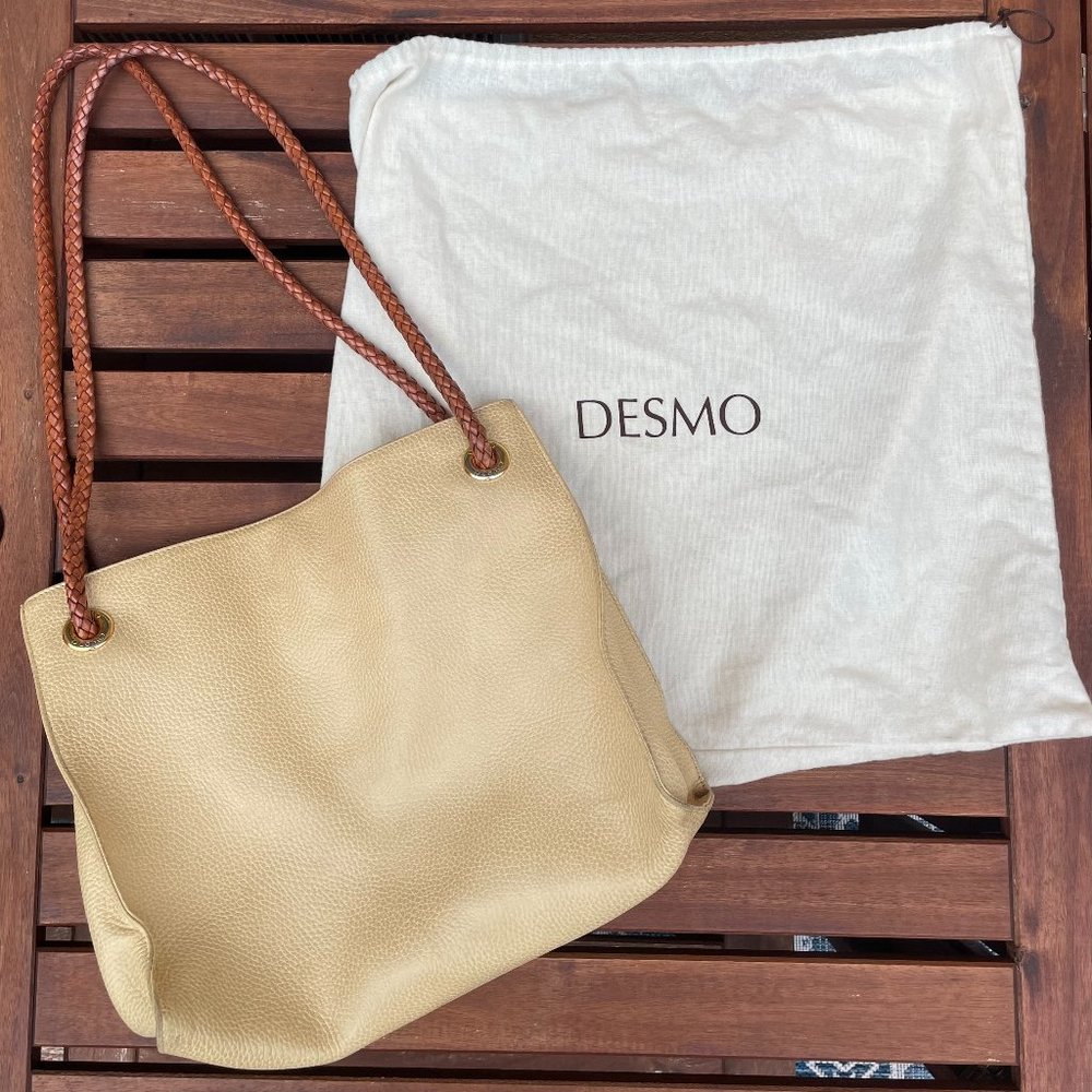 Vintage Desmo leather purse with gold grommet details and woven leather handles